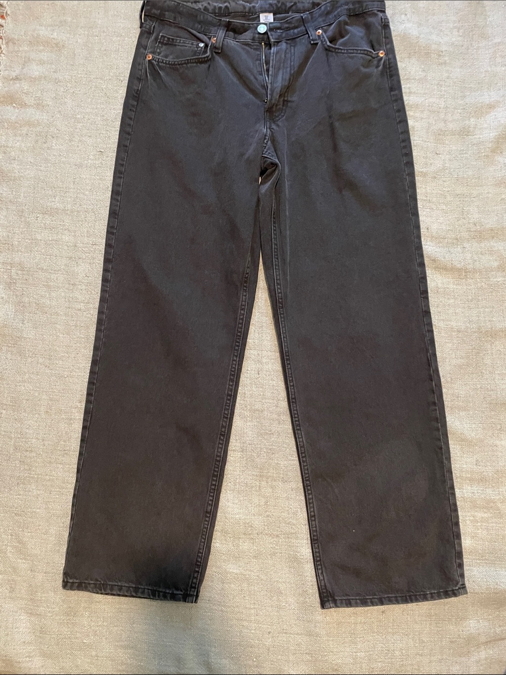 Faded black denim jeans